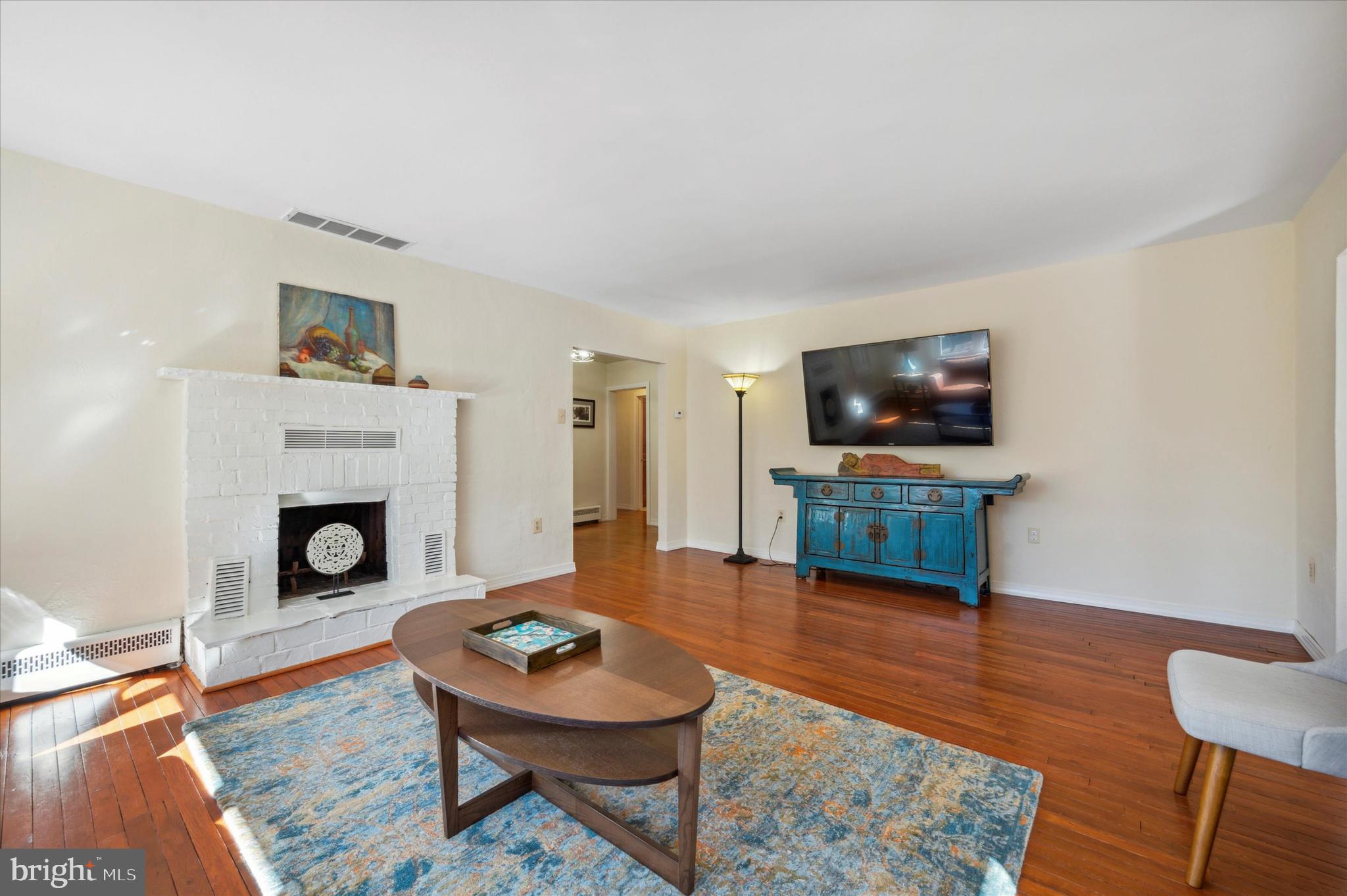 700 Pine Ridge Road Media, PA 19063 - Photo 5 of 37 Living room with wood fireplace