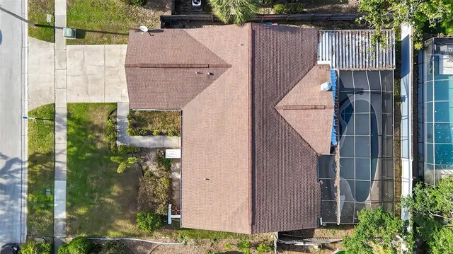 a backyard of a house with lots of green space