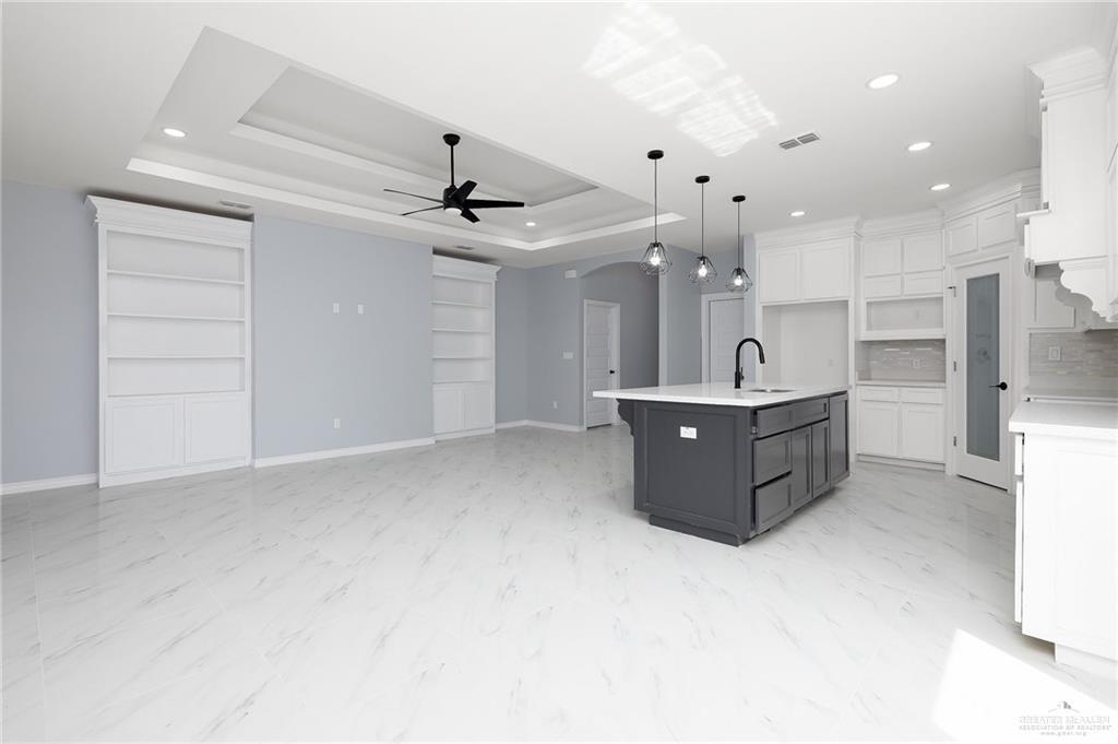 3708 Canan Street Weslaco, TX 78596 - Photo 3 of 13 a living room with a sink furniture and kitchen view