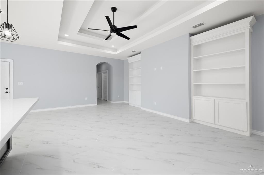 3708 Canan Street Weslaco, TX 78596 - Photo 5 of 13 a view of a livingroom with a ceiling fan