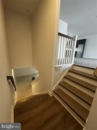 a view of entryway with wooden floor