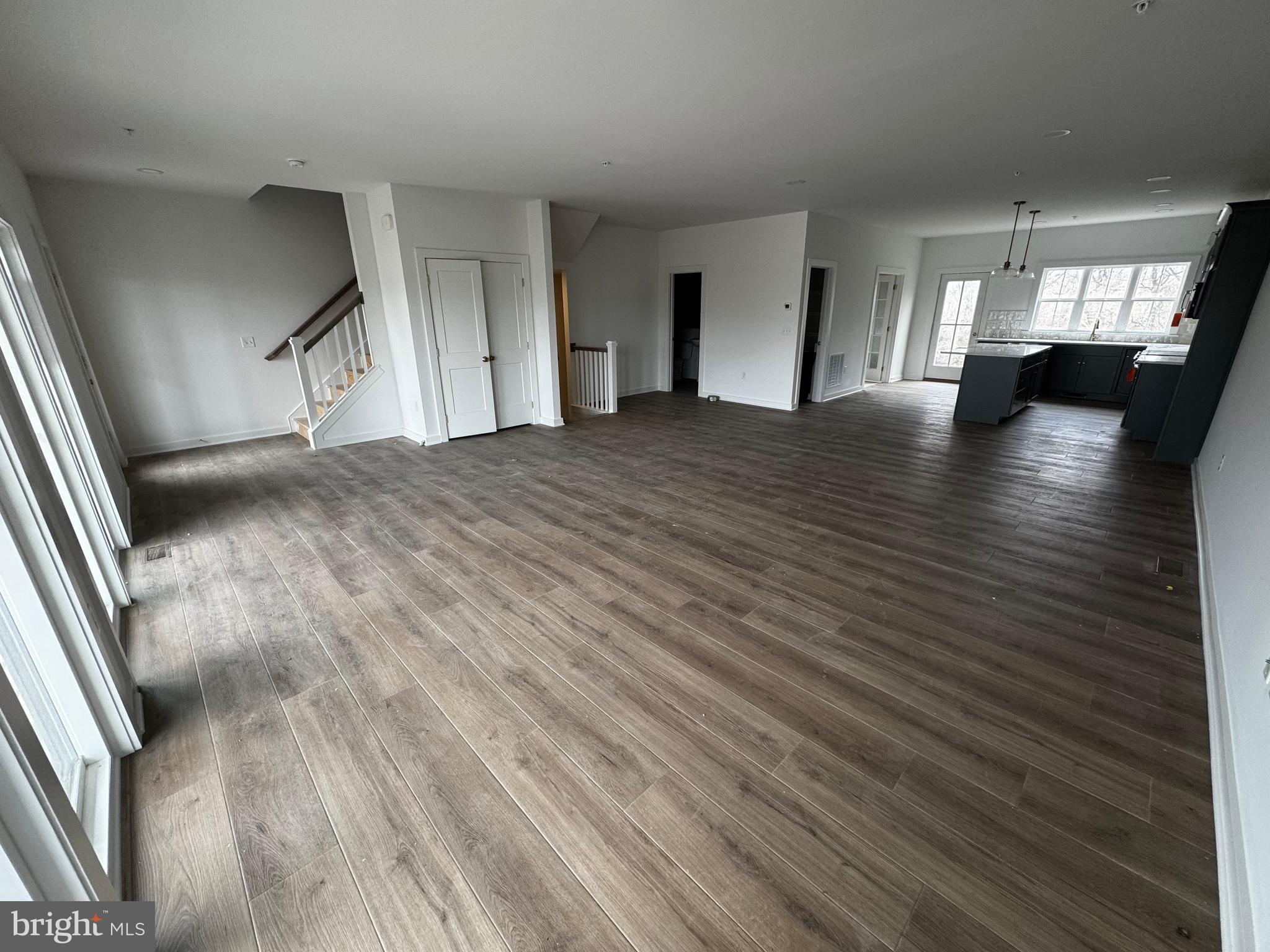 185 Trailside Court Lebanon, PA 17042 - Photo 6 of 17 an empty room with wooden floor and windows