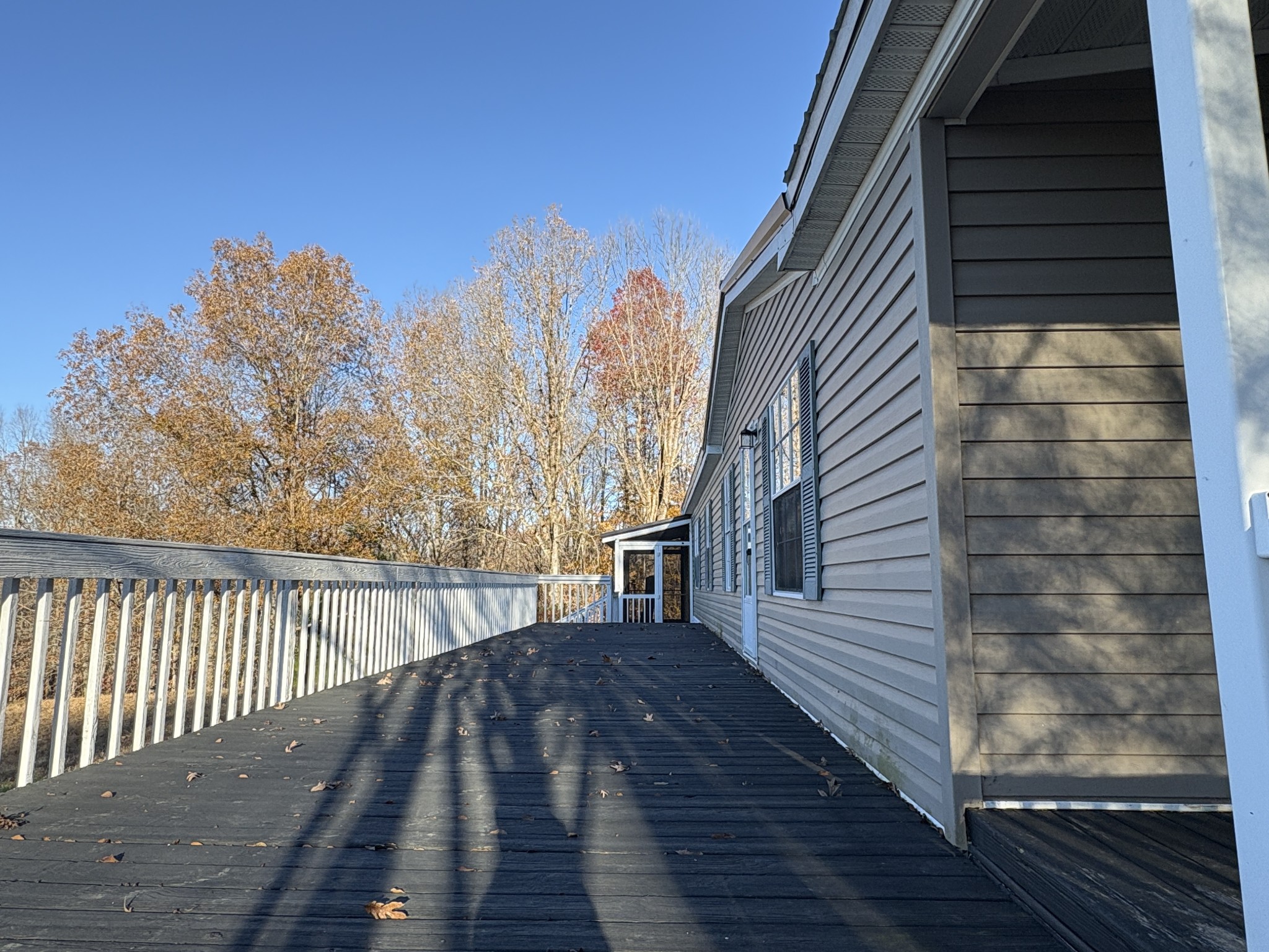 298 Leonard Jackson Road Waynesboro, TN 38485 - Photo 2 of 100 a view of a balcony with wooden floor and fence