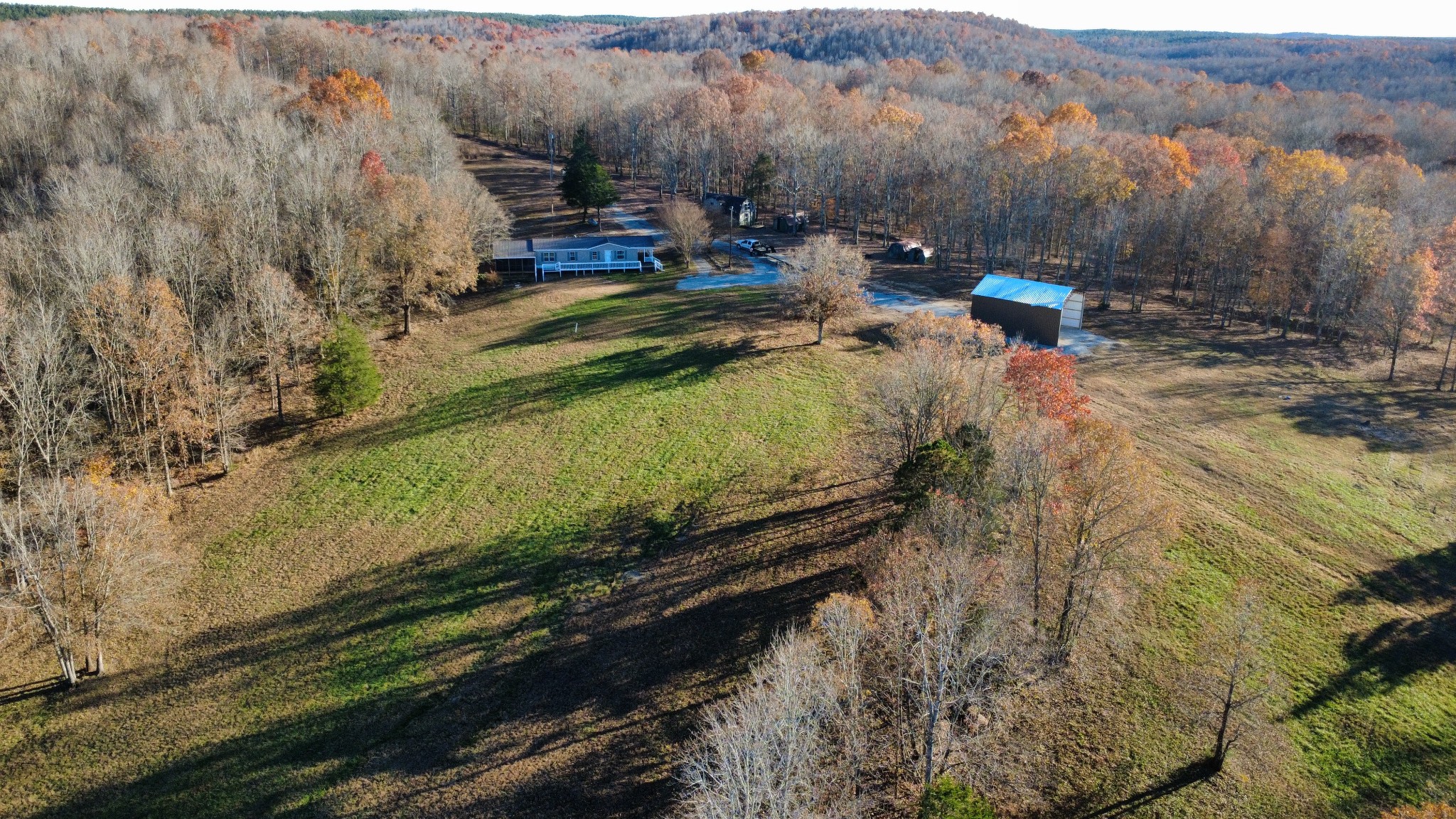 298 Leonard Jackson Road Waynesboro, TN 38485 - Photo 43 of 100 a view of a backyard with wooden fence