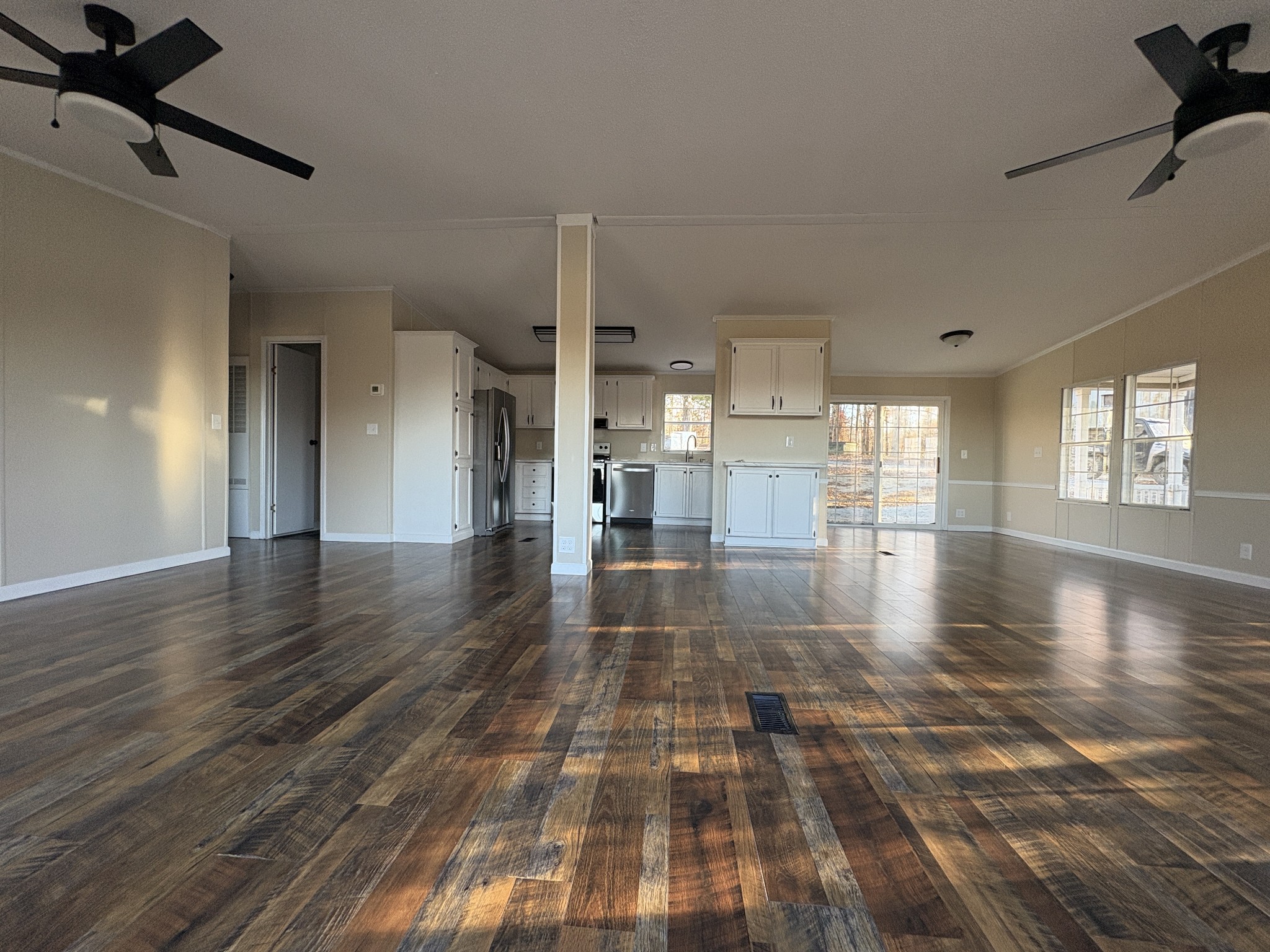298 Leonard Jackson Road Waynesboro, TN 38485 - Photo 9 of 100 a view of empty room with wooden floor and windows
