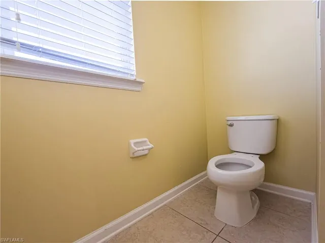 a bathroom with a toilet