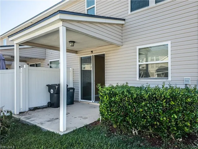 a front view of a house with a porch