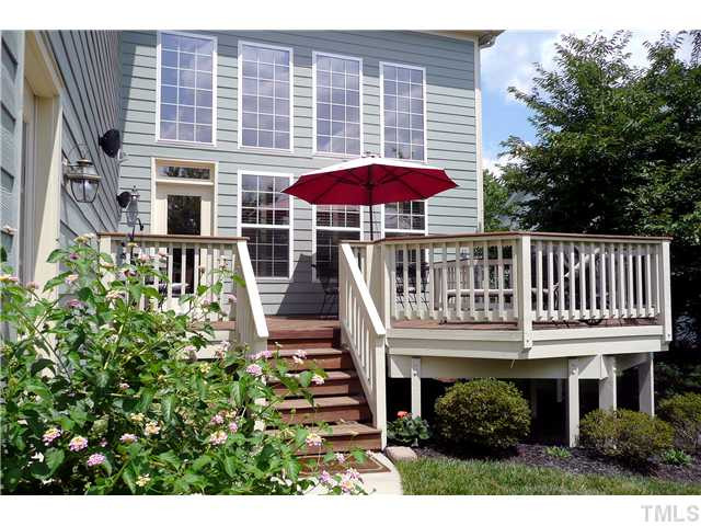 10504 Swerling Way Raleigh, NC 27614 - Photo 23 of 25 The large deck is perfect for entertaining and offers lovely views of the landscaped backyard. Patio/Deck