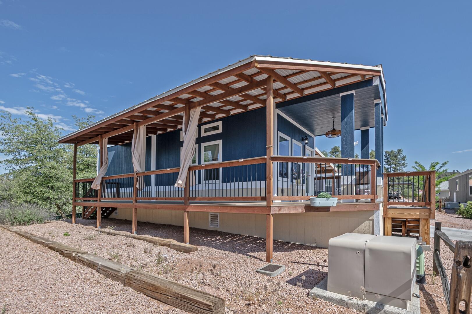 16 North Star Vale Road, Unit 122B Star Valley, AZ 85541 - Photo 20 of 21 a balcony with furniture and next to a yard
