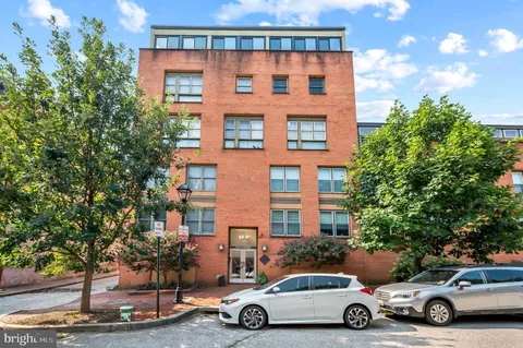 a car parked in front of a building