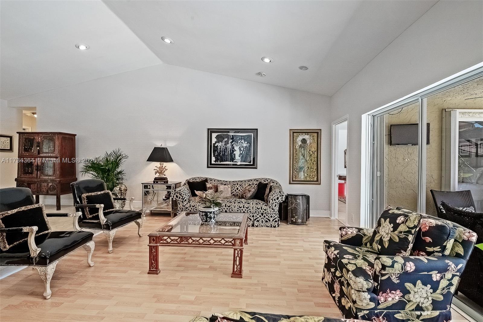 7260 Northwest 4th Avenue Boca Raton, FL 33487 - Photo 13 of 59 a living room with furniture