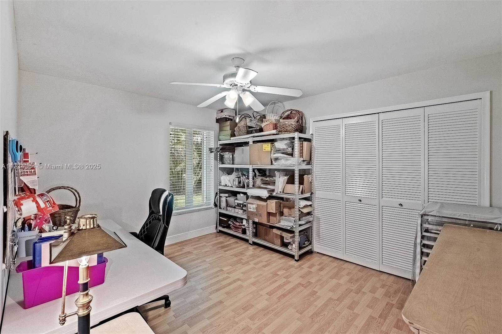 7260 Northwest 4th Avenue Boca Raton, FL 33487 - Photo 25 of 59 a view of a livingroom with furniture and window