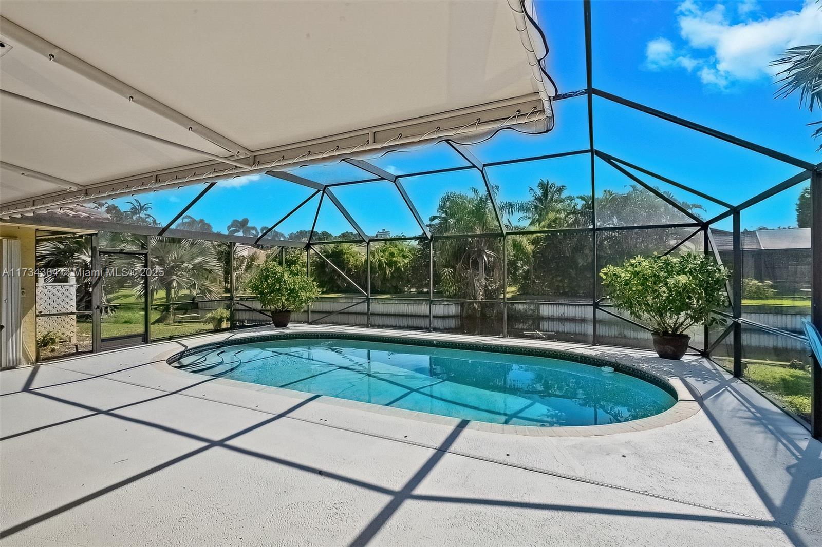 7260 Northwest 4th Avenue Boca Raton, FL 33487 - Photo 40 of 59 a view of a backyard with sitting area