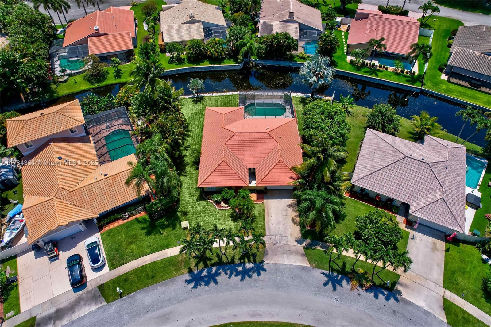7260 Northwest 4th Avenue Boca Raton, FL 33487 - Photo 48 of 59 an aerial view of house with yard swimming pool and outdoor seating