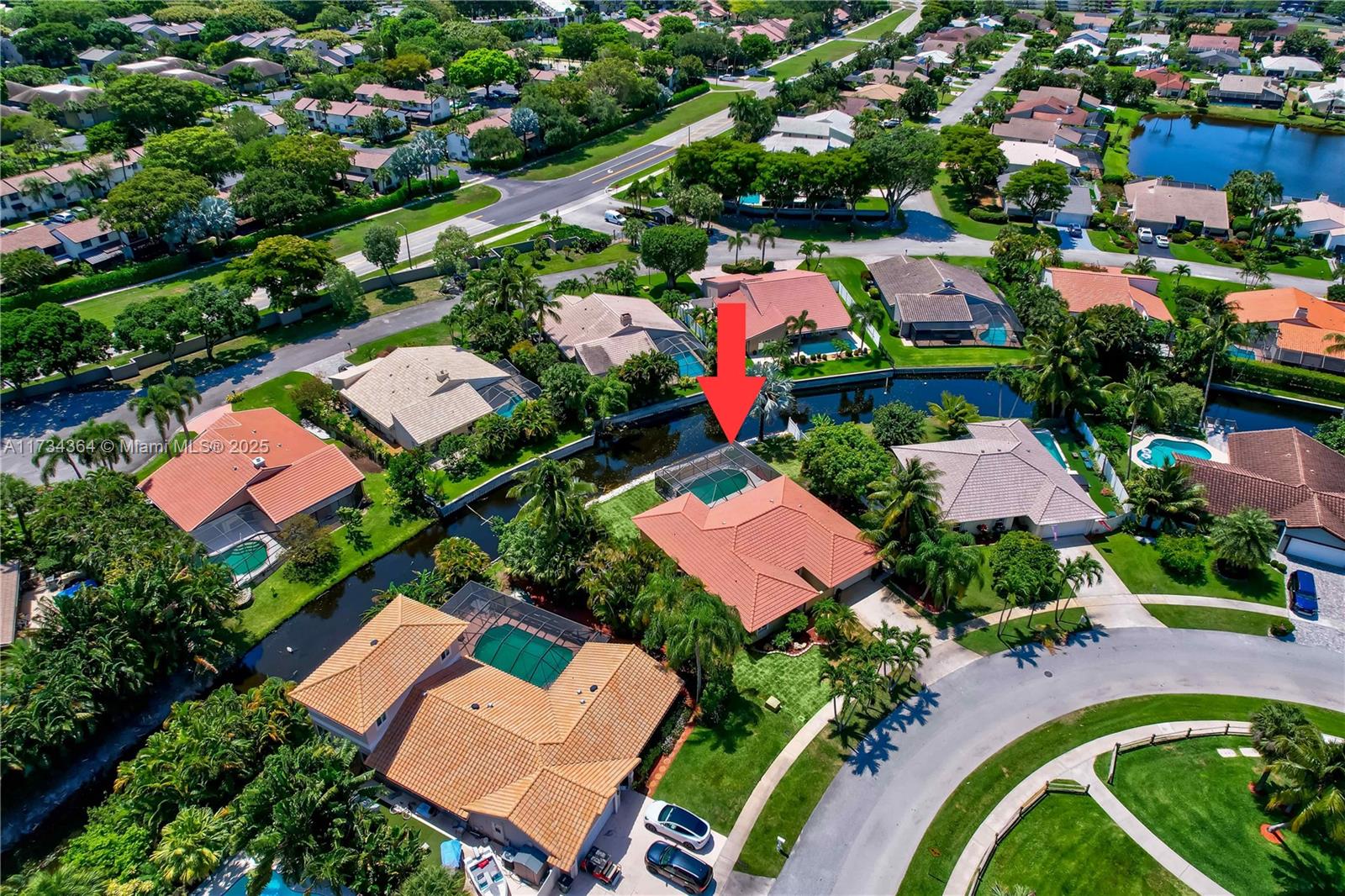 7260 Northwest 4th Avenue Boca Raton, FL 33487 - Photo 50 of 59 an aerial view of residential houses with outdoor space and swimming pool