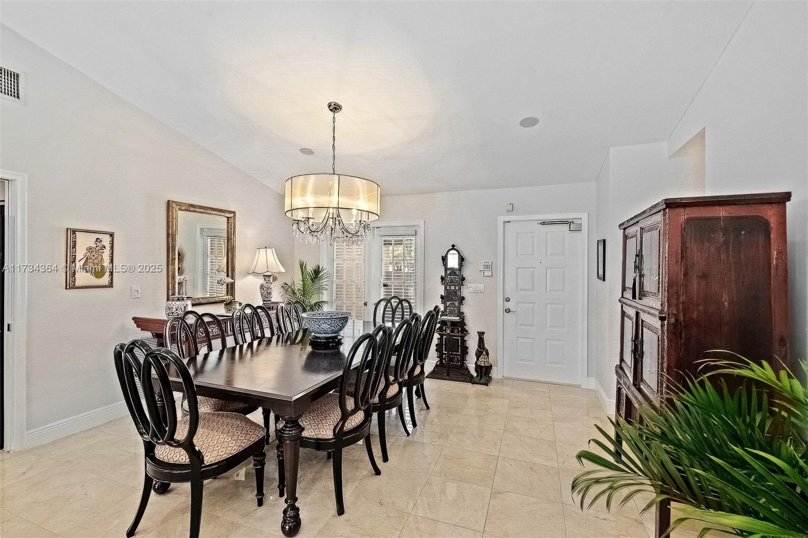 7260 Northwest 4th Avenue Boca Raton, FL 33487 - Photo 8 of 59 a view of a dining room with furniture