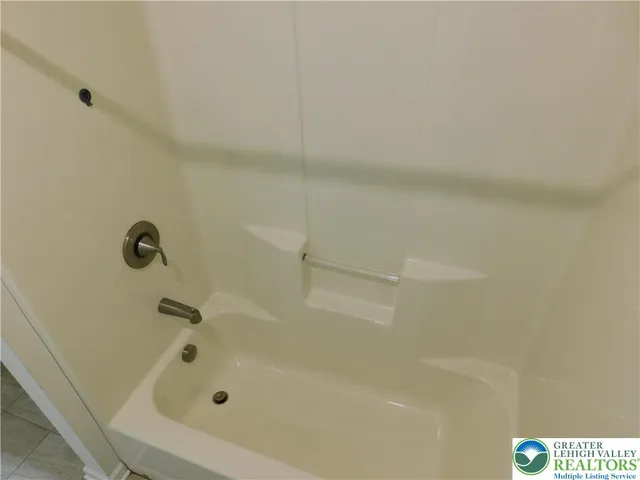 a bathroom with a tub