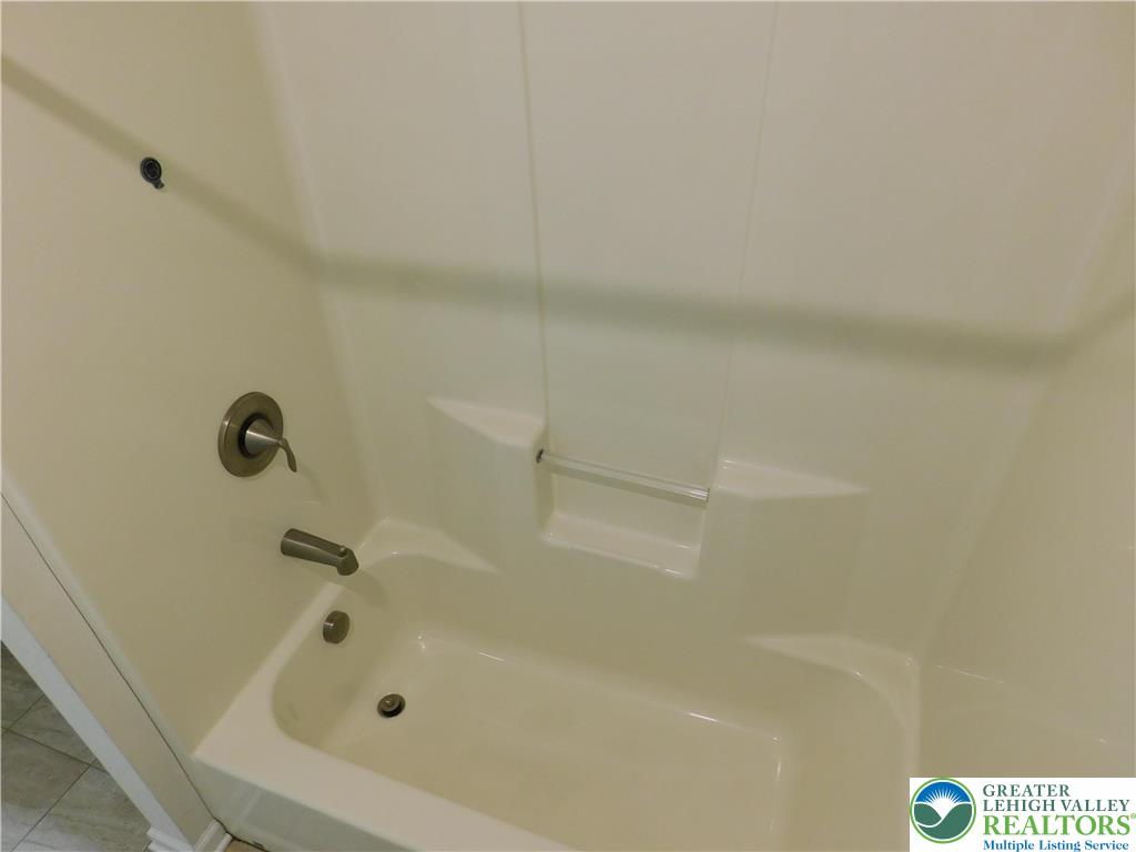 821 Masslich Street Bethlehem, PA 18018 - Photo 18 of 23 a bathroom with a tub