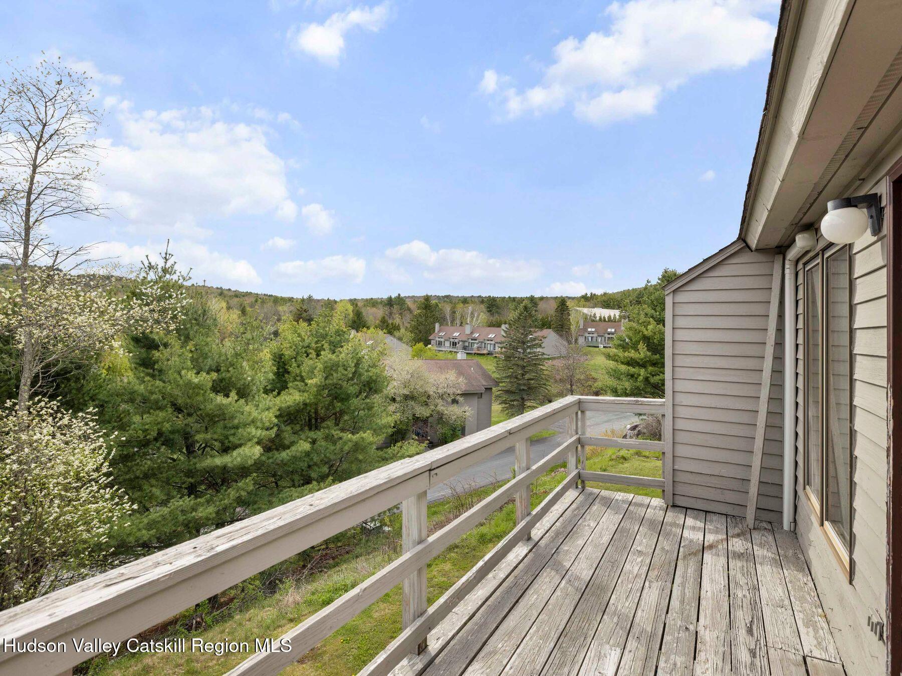 55 Windham Ridge Road, Unit 15H Windham, NY 12496 - Photo 27 of 34 a view of balcony with furniture