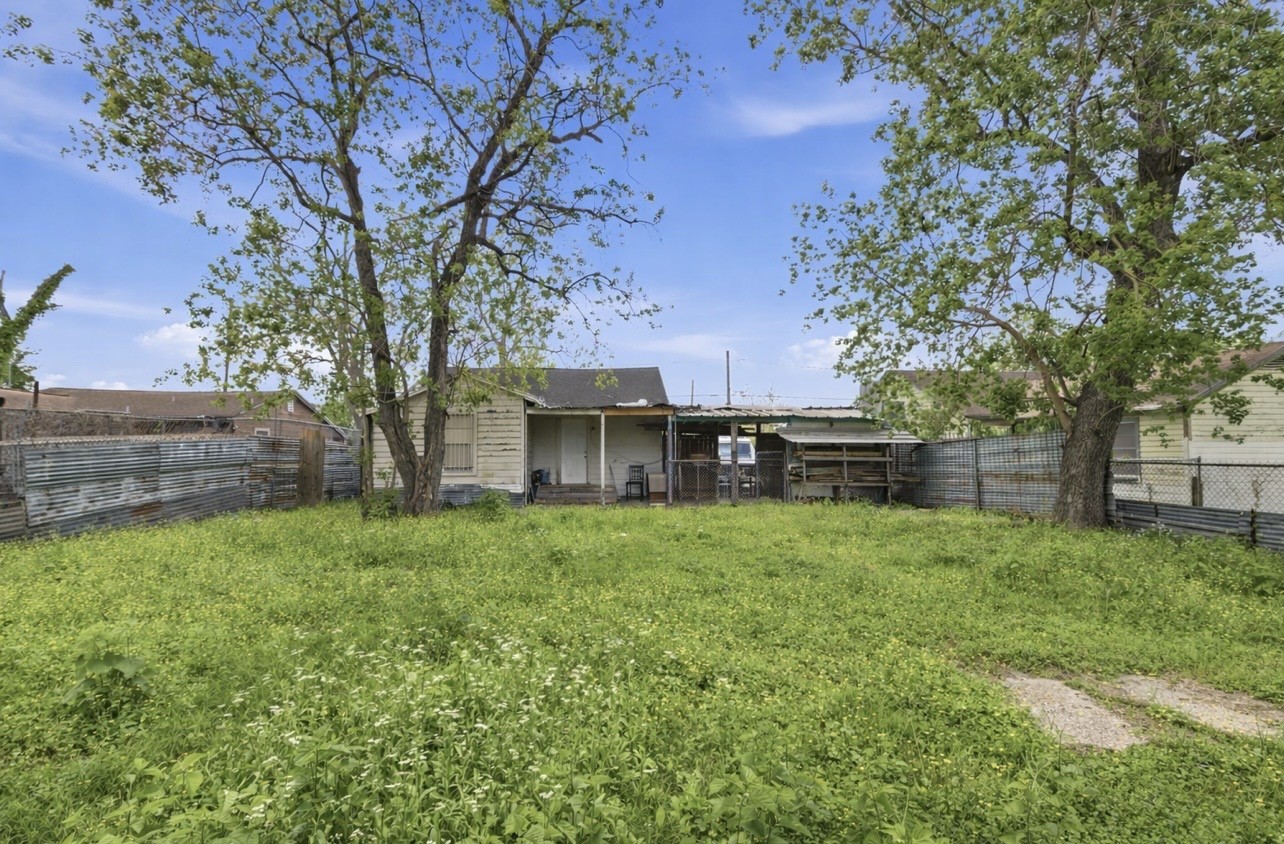 2423 Chamberlain Street Houston, TX 77093 - Photo 14 of 14 a view of a house with backyard and garden