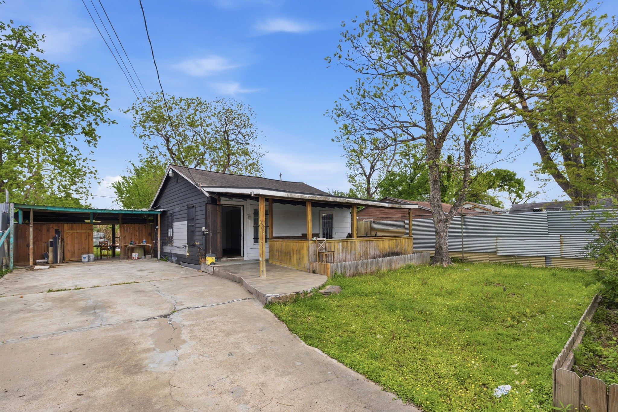 2423 Chamberlain Street Houston, TX 77093 - Photo 3 of 14 a house with a tree in front of it