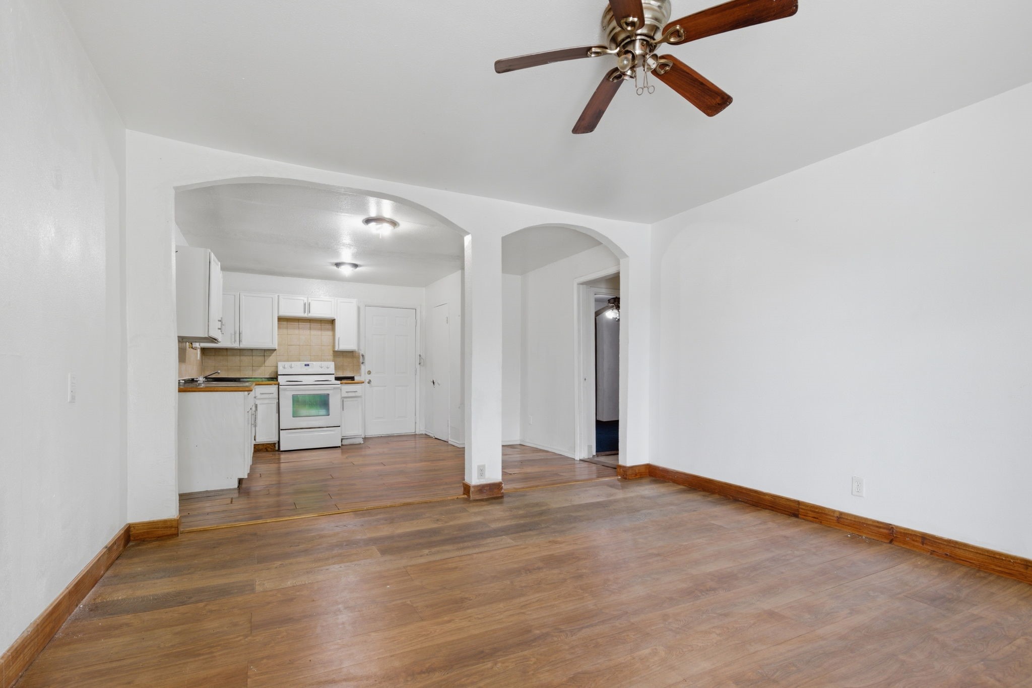 2423 Chamberlain Street Houston, TX 77093 - Photo 5 of 14 a view of an empty room and kitchen view