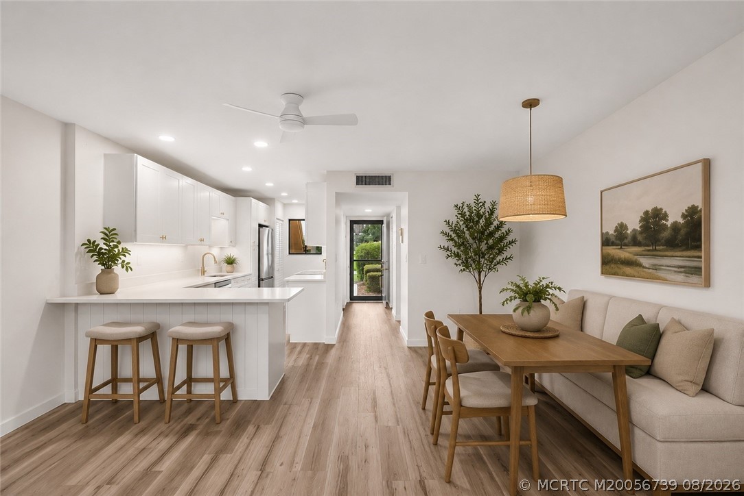 5303 Southeast Miles Grant Road, Unit L101 Stuart, FL 34997 - Photo 1 of 66 AI GENERATED