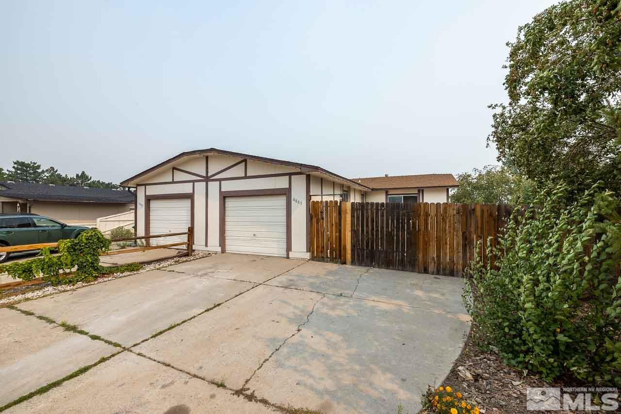 6885 Lotus Street Reno, NV 89506 - Photo 1 of 11 a view of a house with a outdoor space