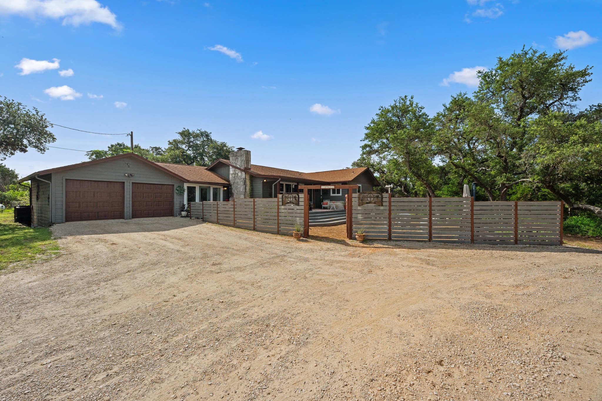 12932 Nutty Brown Road Austin, TX 78737 - Photo 28 of 40 The Ranch - The Ranch welcomes you with classic Hill Country architecture and a spacious private setting.