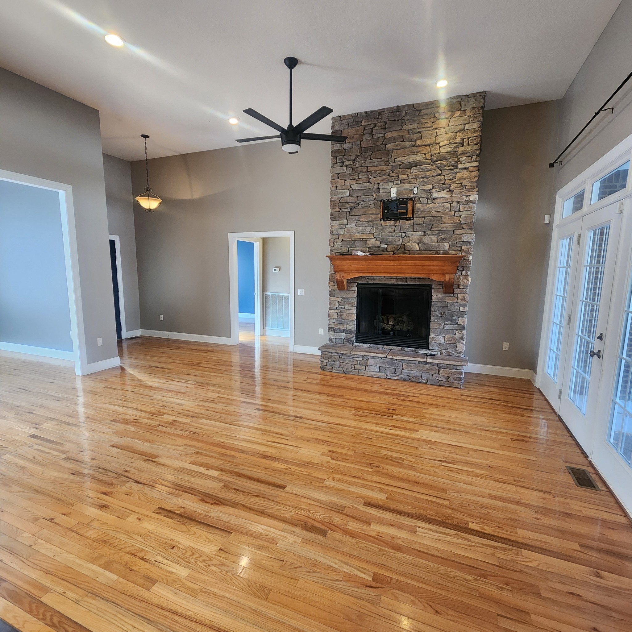31 Chickory Lane Monteagle, TN 37356 - Photo 11 of 61 a view of a livingroom with wooden floor a fireplace and window