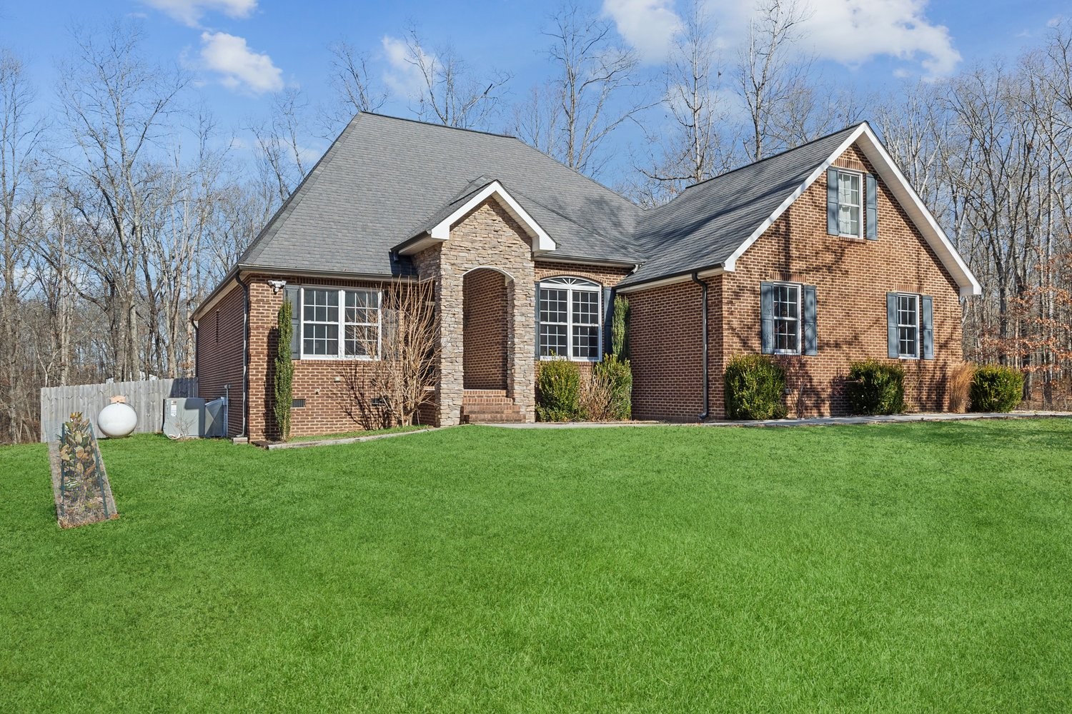 31 Chickory Lane Monteagle, TN 37356 - Photo 2 of 61 a front view of house with yard and green space