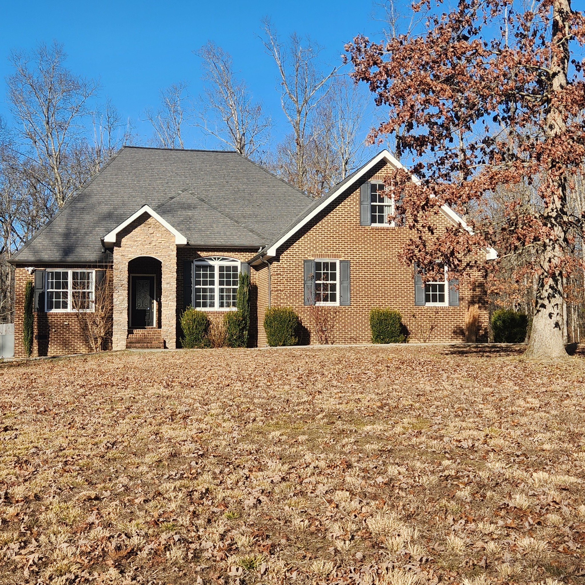 31 Chickory Lane Monteagle, TN 37356 - Photo 2 of 53 a front view of a house with a yard