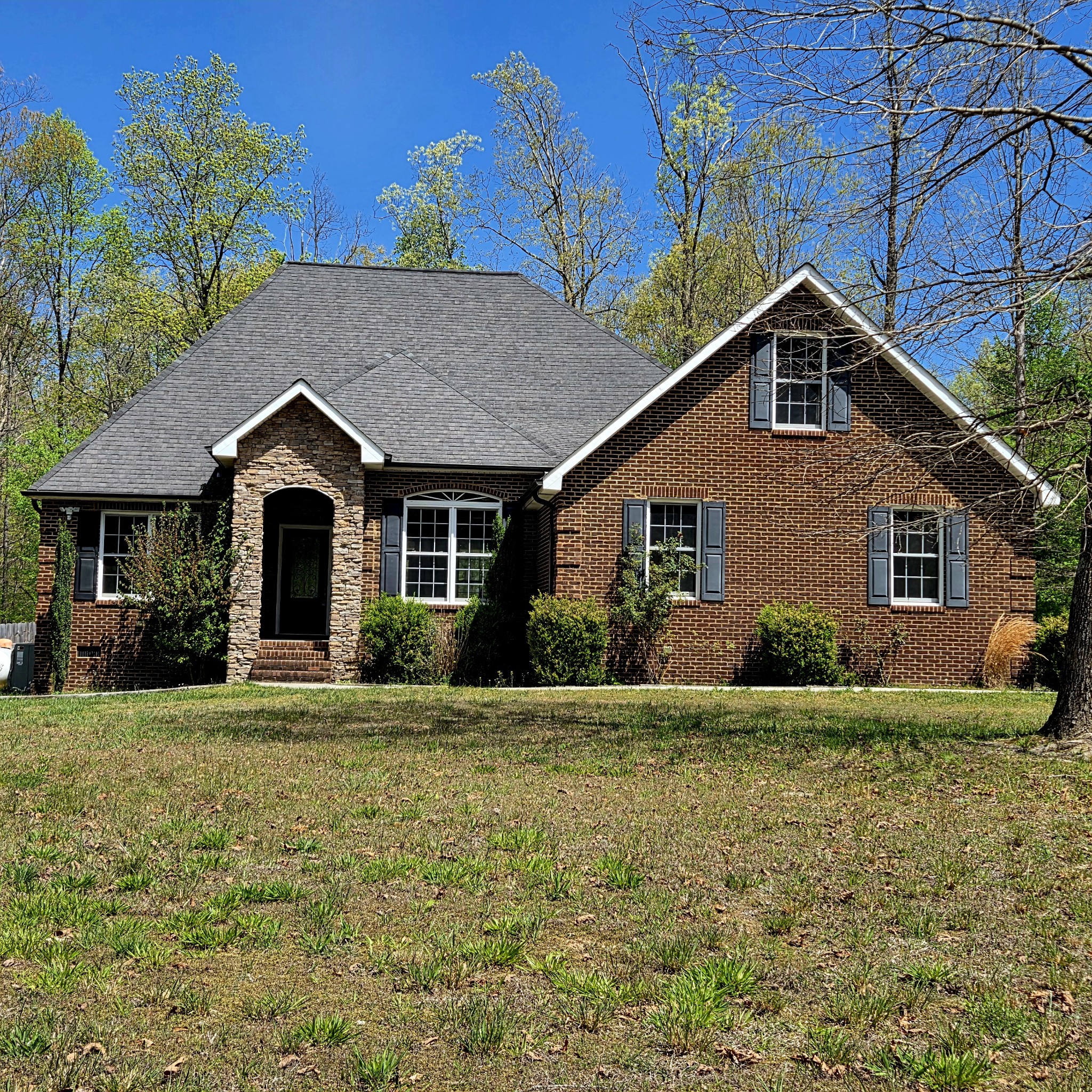 31 Chickory Lane Monteagle, TN 37356 - Photo 47 of 61 a front view of house with yard and green space