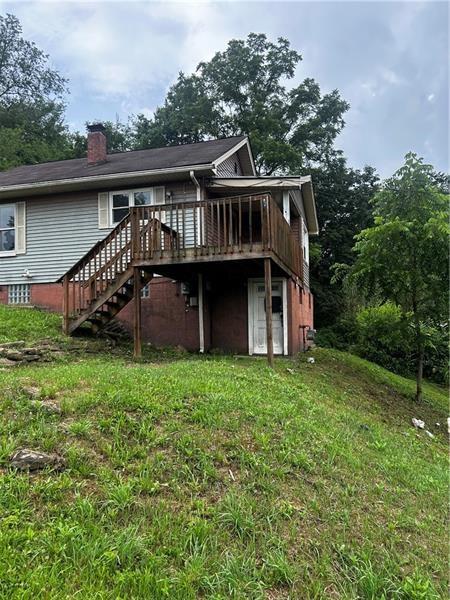 112 Wide Street Houston, PA 15342 - Photo 3 of 7 a front view of a house with garden