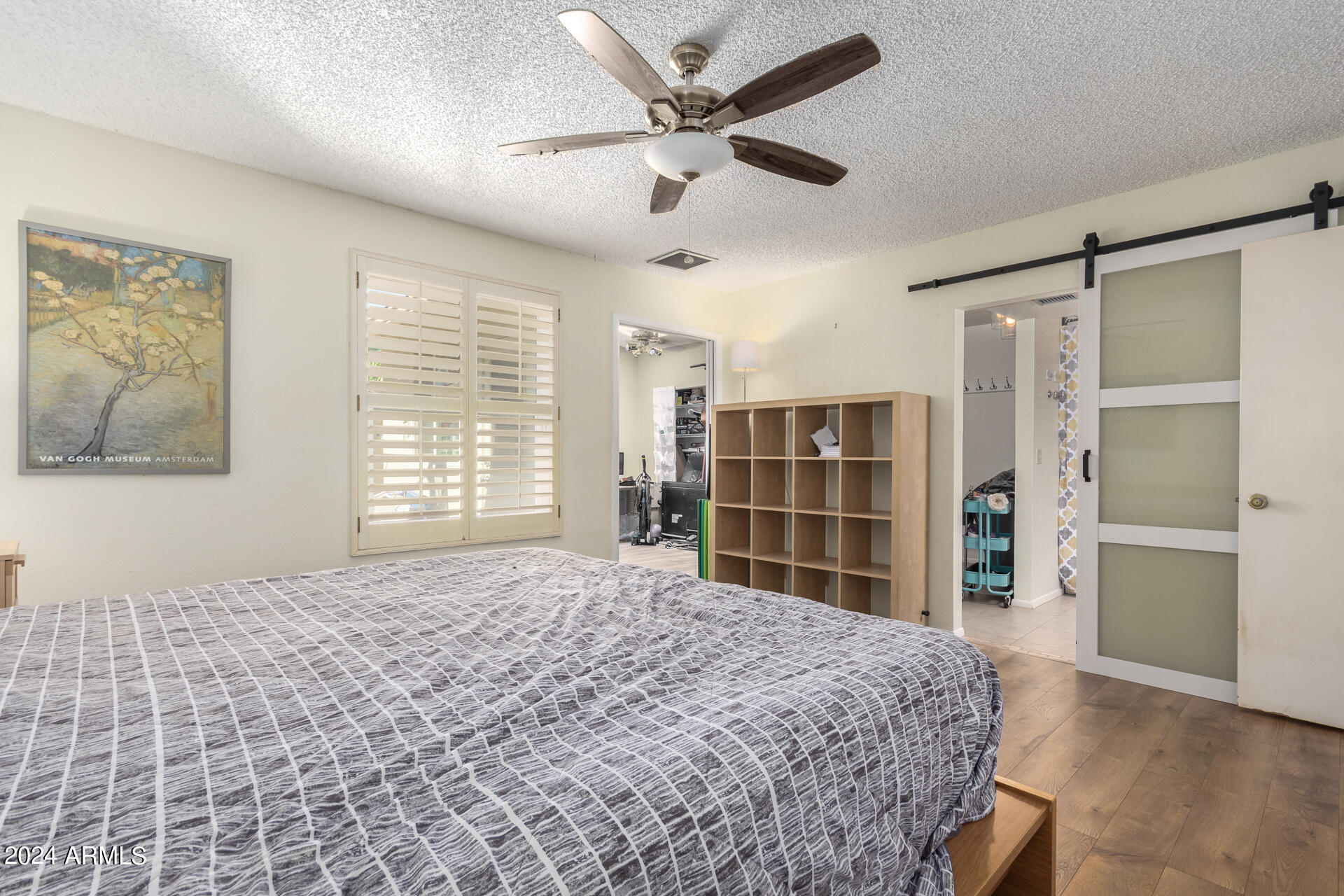 6516 West Mountain View Road Glendale, AZ 85302 - Photo 21 of 35 a bedroom with a bed and a window