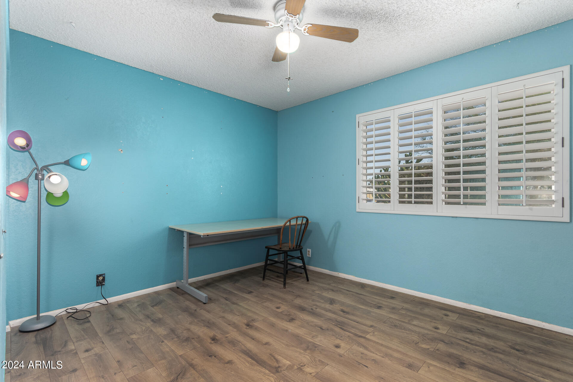 6516 West Mountain View Road Glendale, AZ 85302 - Photo 33 of 35 a bedroom with a bed and a window