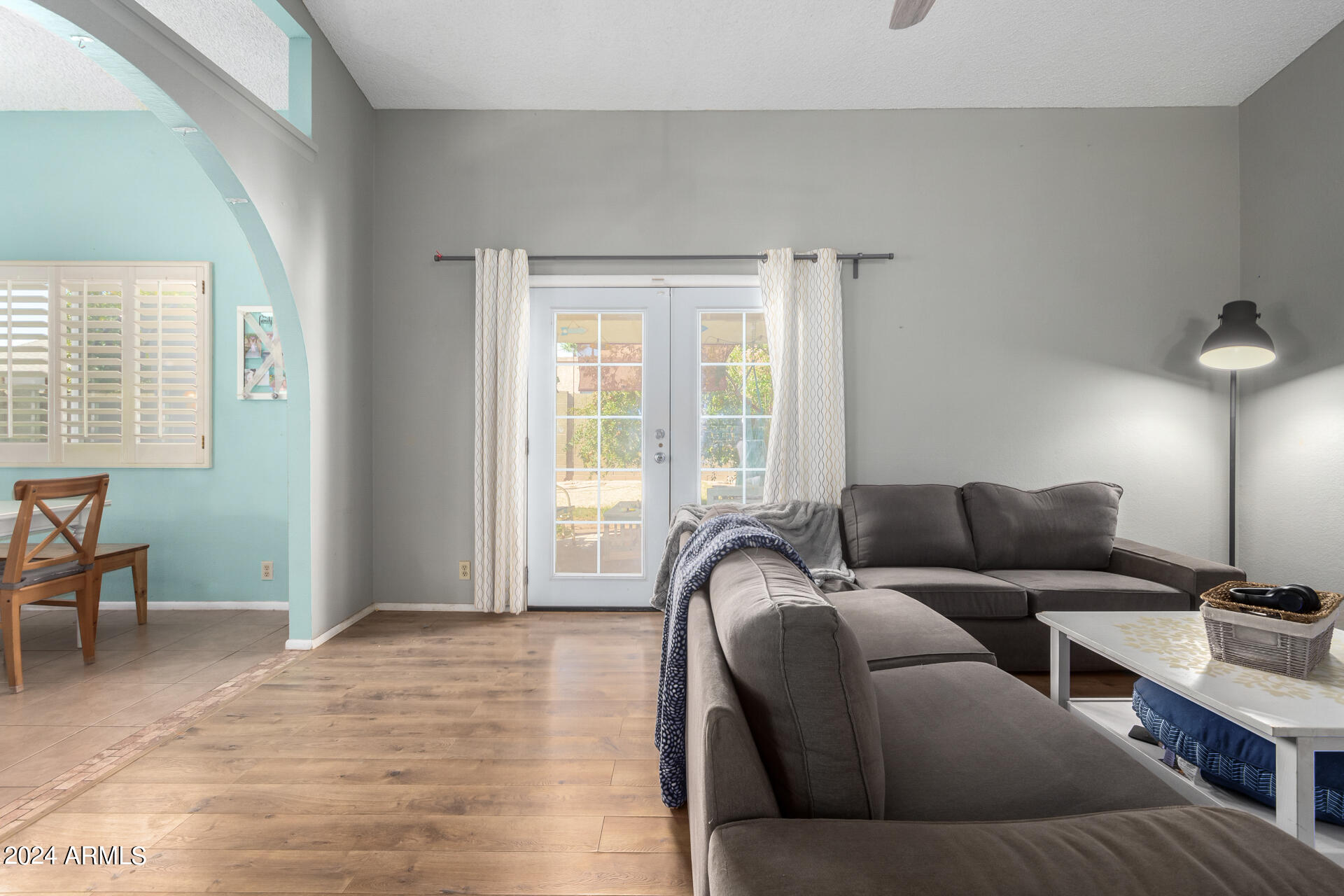6516 West Mountain View Road Glendale, AZ 85302 - Photo 10 of 35 a living room with furniture and a window