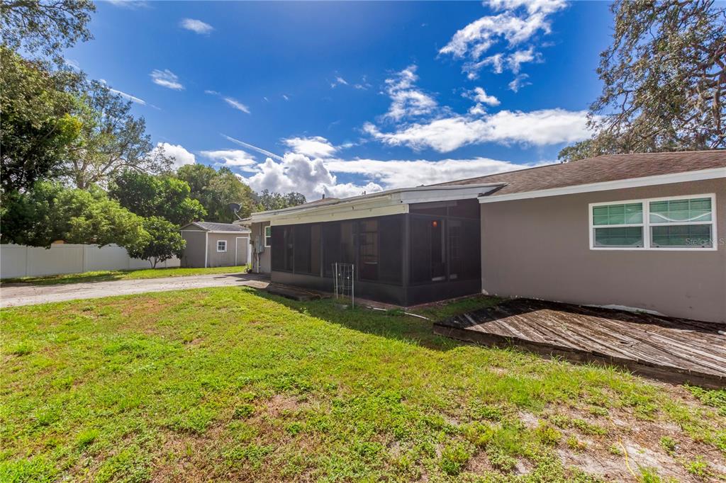 7367 Gates Circle Spring Hill, FL 34606 - Photo 19 of 31 a view of backyard with a tub