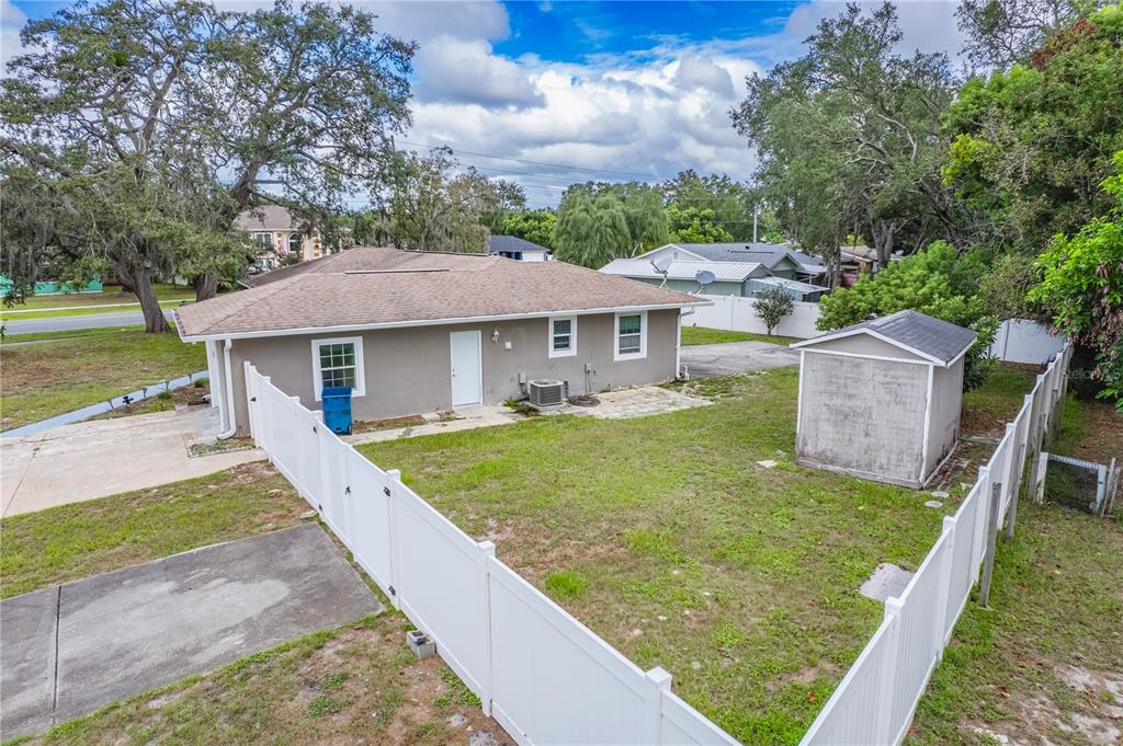 7367 Gates Circle Spring Hill, FL 34606 - Photo 24 of 31 a view of a house with a yard balcony and a patio