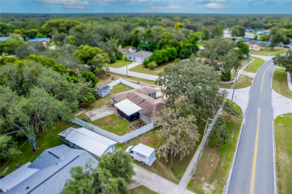 7367 Gates Circle Spring Hill, FL 34606 - Photo 28 of 31 an aerial view of a house with garden space and street view