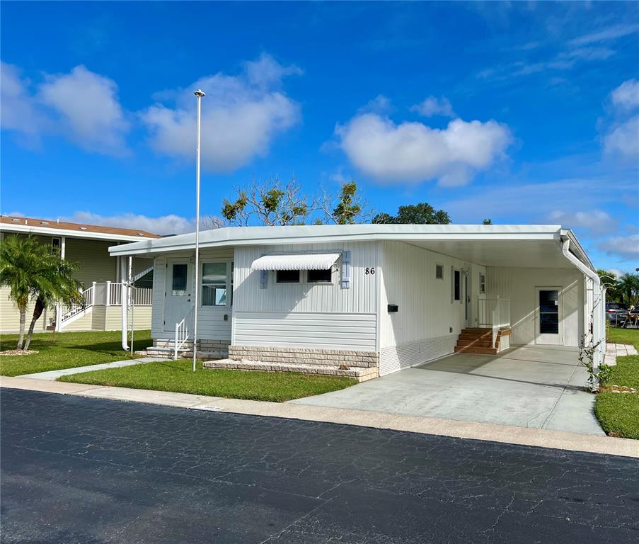 10399 67th Avenue North, Unit 86 St. Petersburg, FL 33708 - Photo 2 of 57