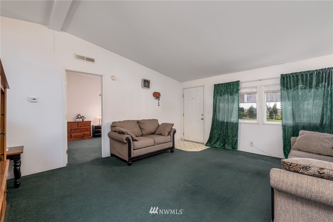 1410 Nooksack Road Everson, WA 98276 - Photo 3 of 26 a living room with furniture and a window