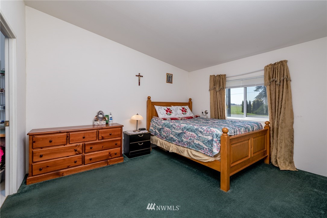 1410 Nooksack Road Everson, WA 98276 - Photo 4 of 26 a bedroom with a bed and window