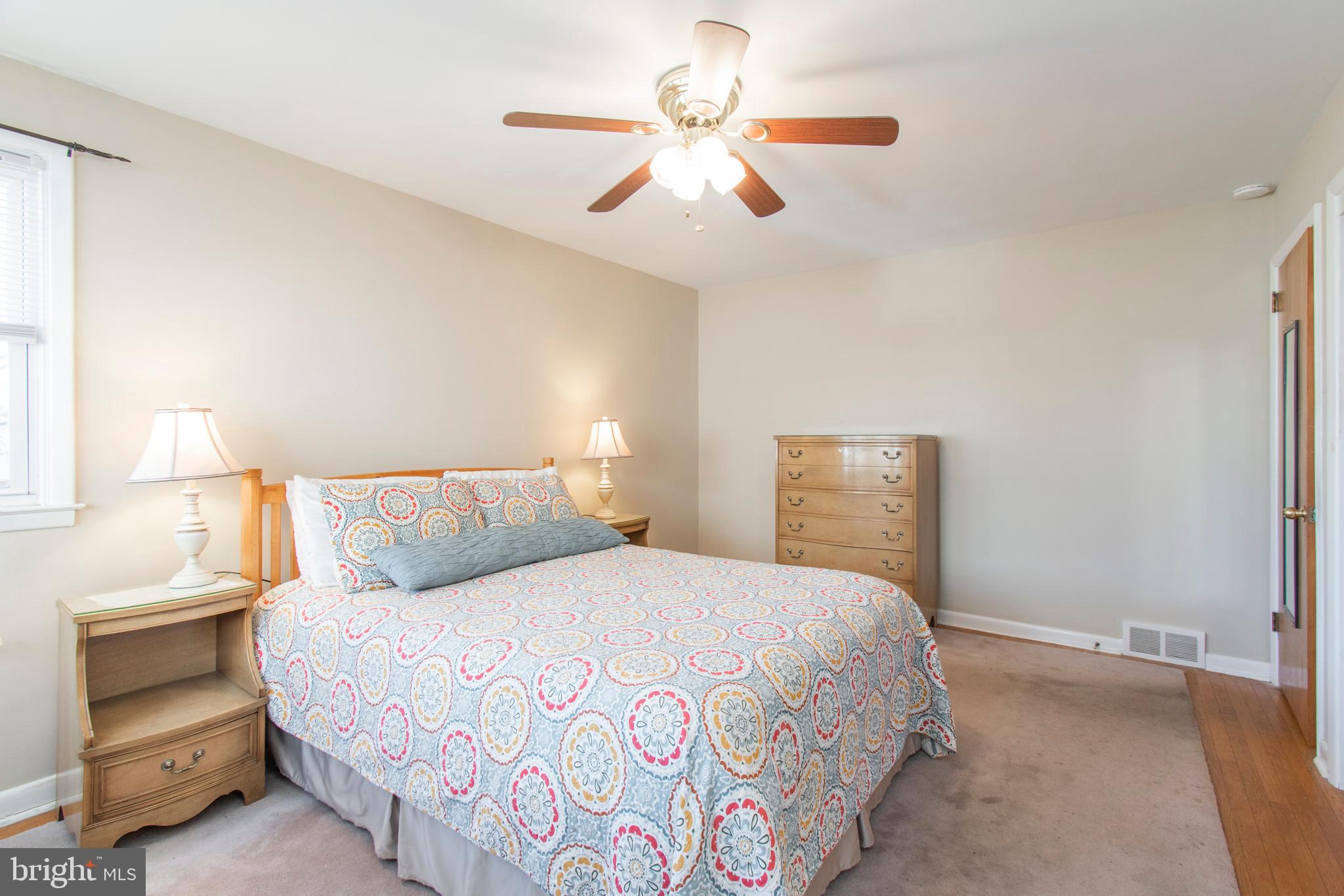 2333 Poplar Road Havertown, PA 19083 - Photo 22 of 38 a bedroom with a bed and a lamp