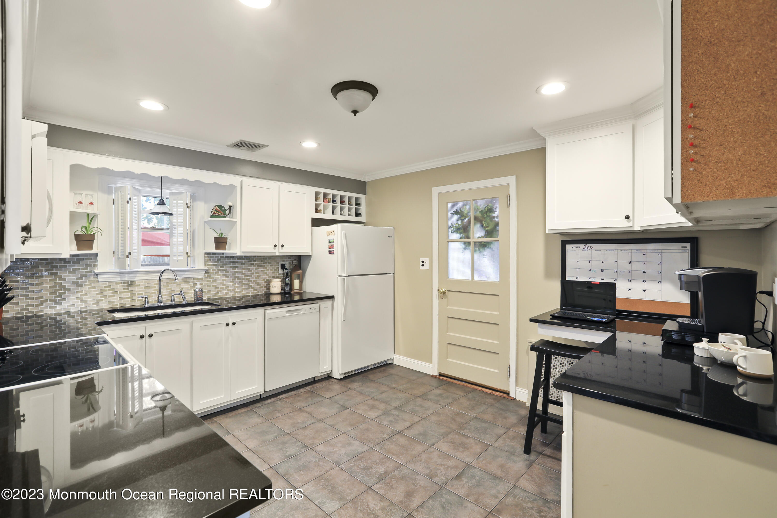 7 Burtina Place Keyport, NJ 07735 - Photo 11 of 29 a kitchen with granite countertop a sink stainless steel appliances and cabinets