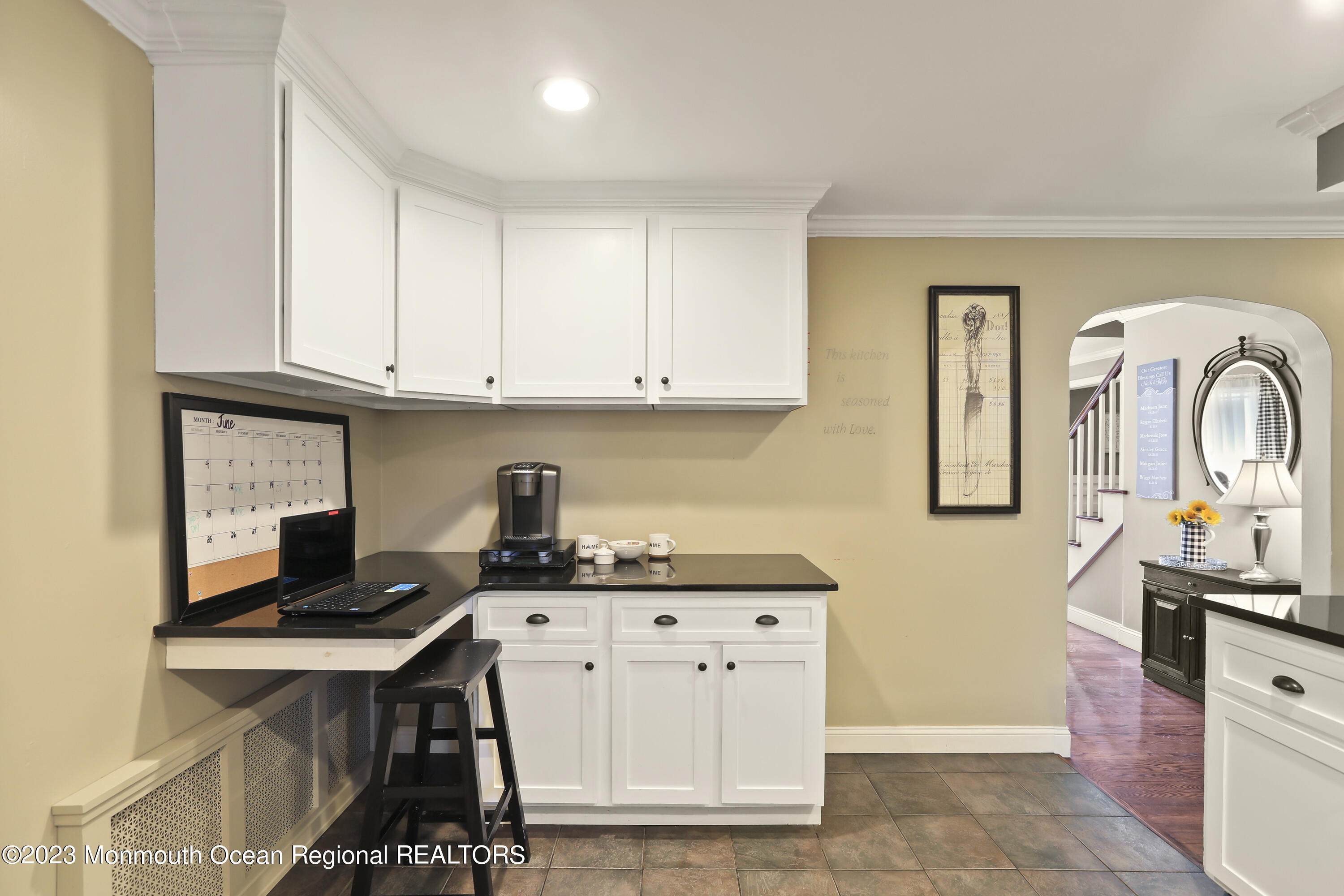 7 Burtina Place Keyport, NJ 07735 - Photo 12 of 29 a kitchen with stainless steel appliances kitchen island granite countertop a stove top oven a sink dishwasher and cabinets with wooden floor