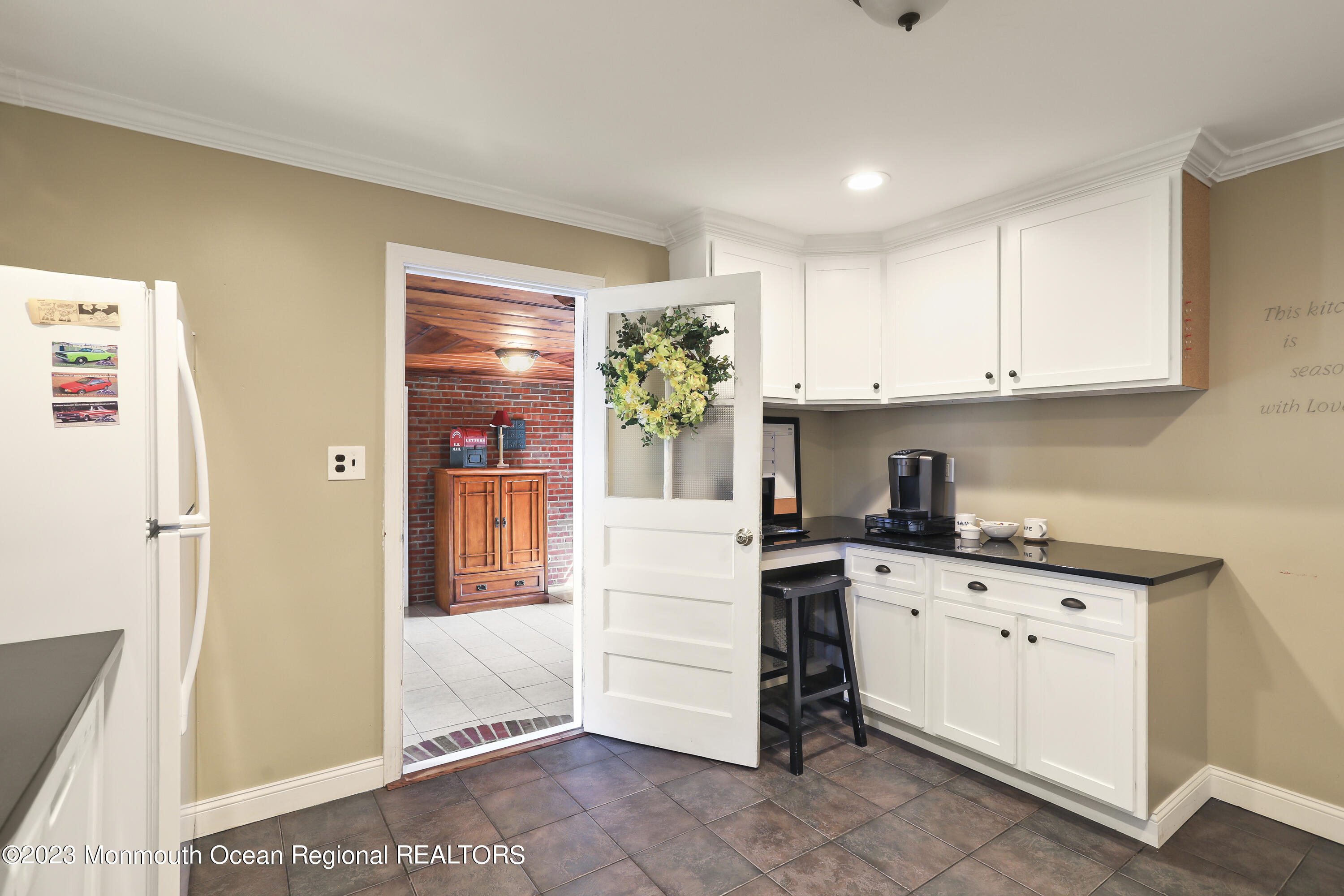 7 Burtina Place Keyport, NJ 07735 - Photo 13 of 29 a kitchen with a stove a sink and a refrigerator