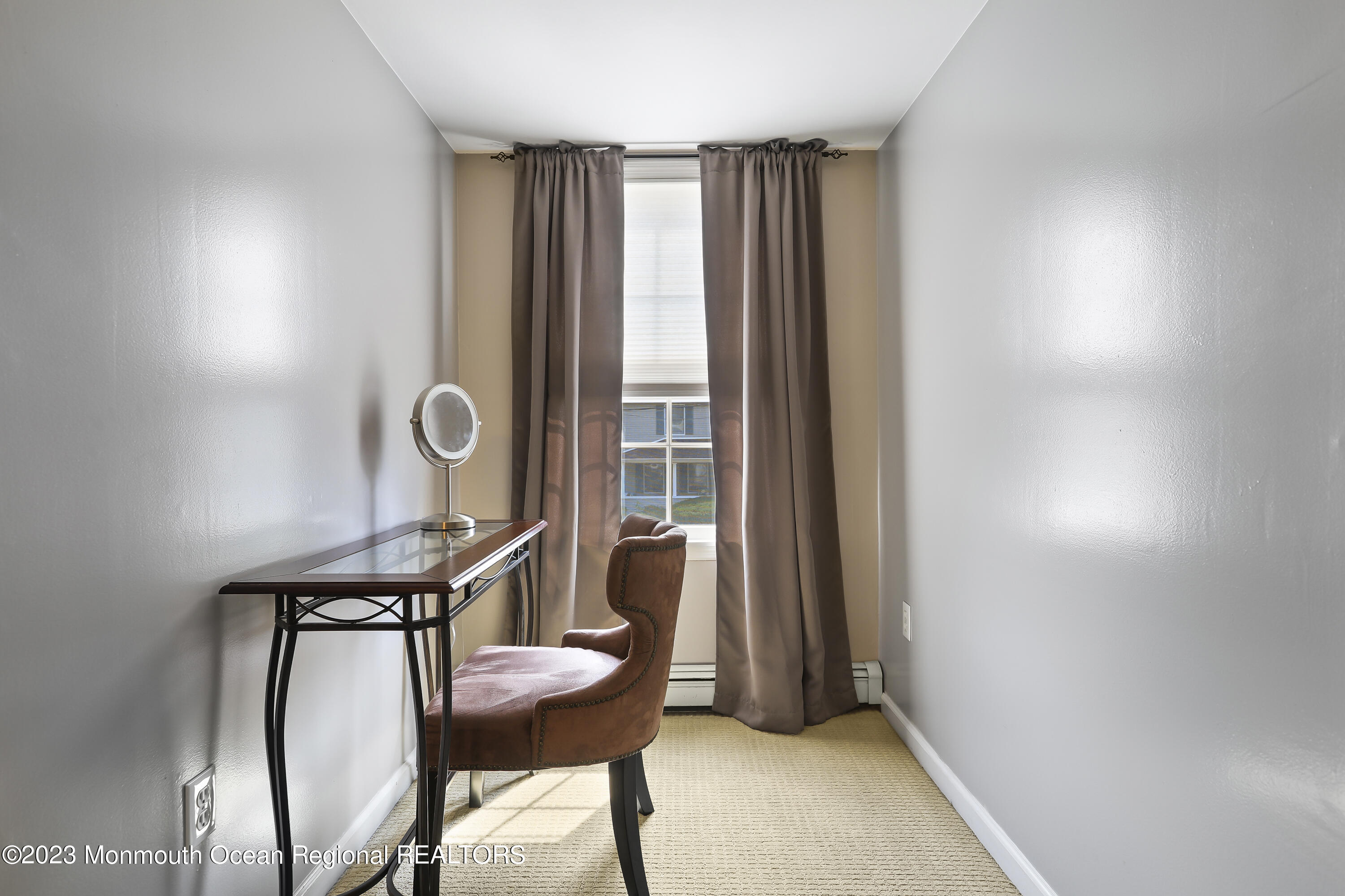 7 Burtina Place Keyport, NJ 07735 - Photo 20 of 29 a view of a room that has a window and chair