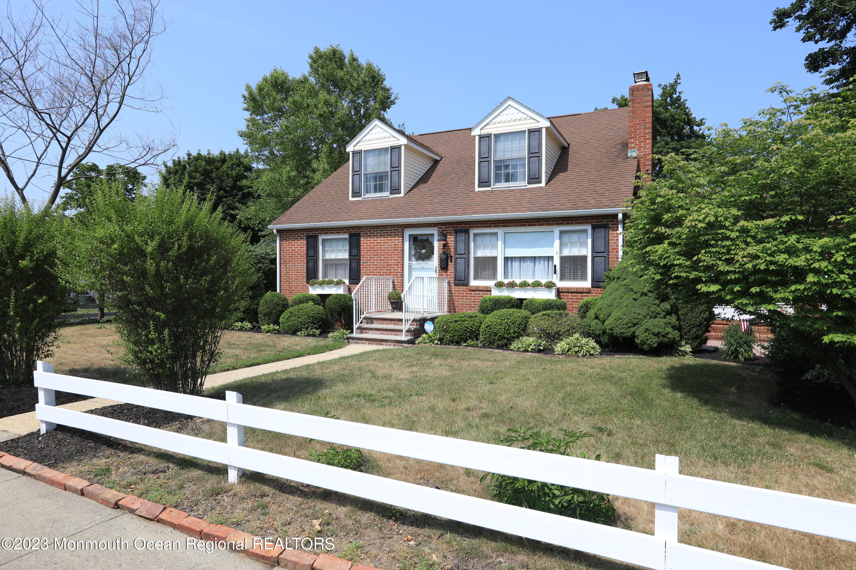 7 Burtina Place Keyport, NJ 07735 - Photo 2 of 29 a front view of a house with a yard