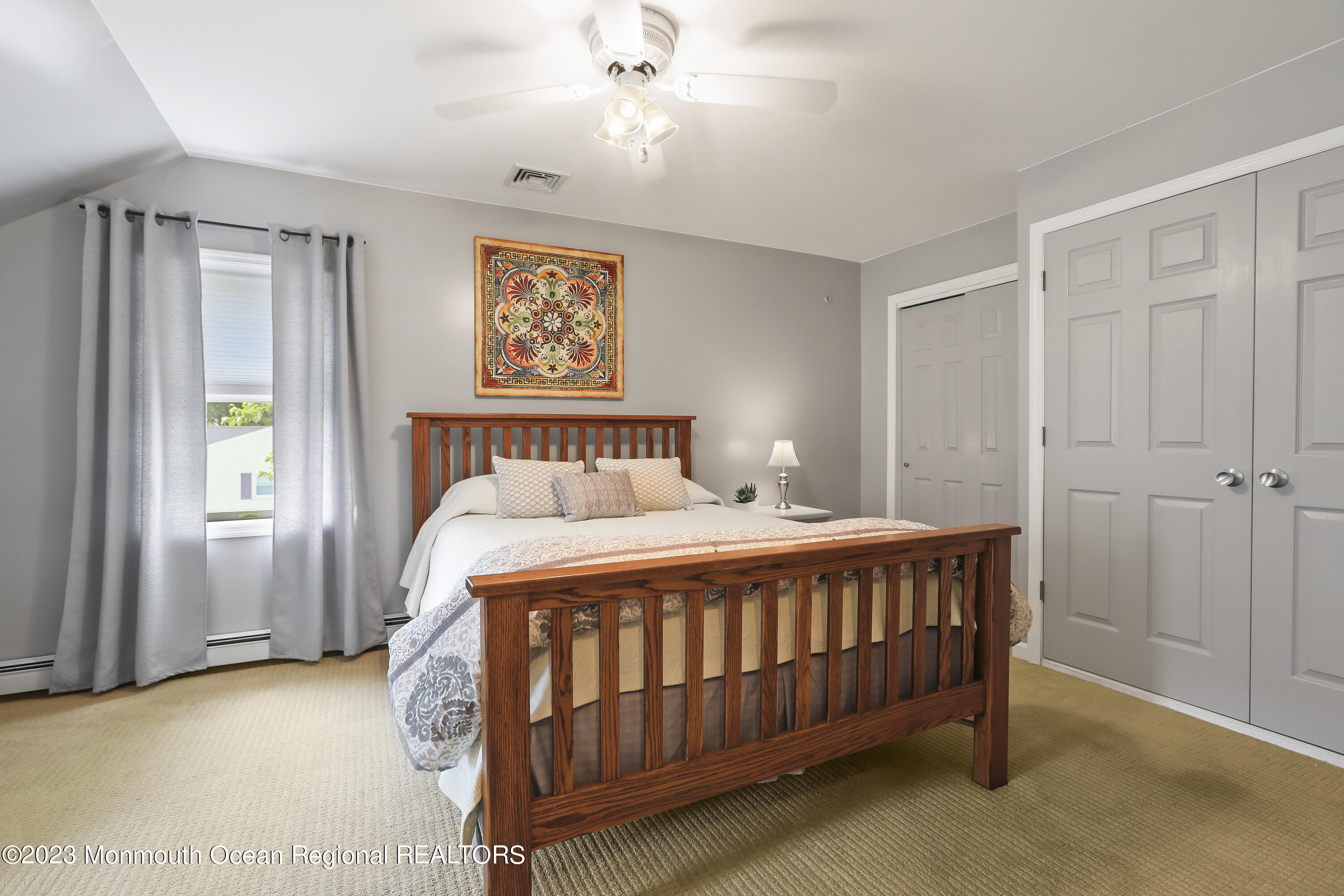 7 Burtina Place Keyport, NJ 07735 - Photo 21 of 29 a bedroom with a bed and a window